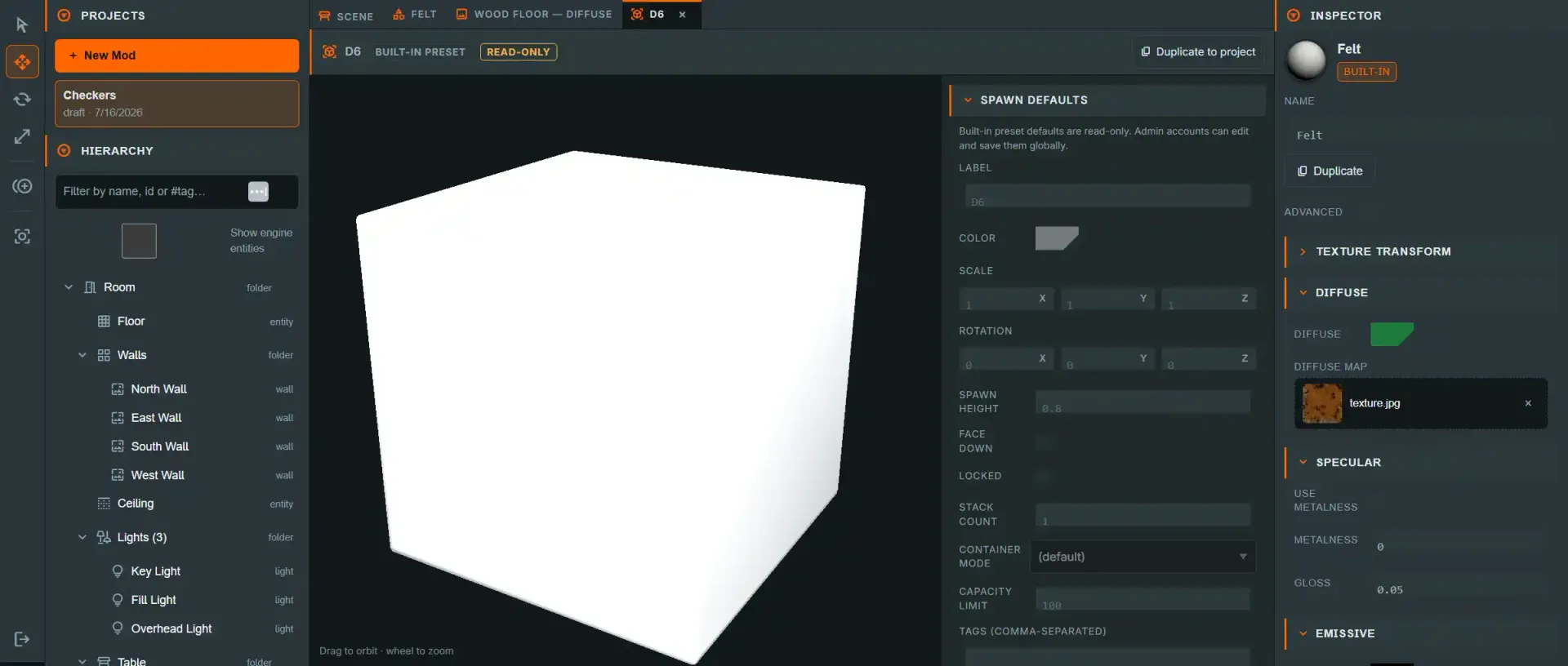 The Model editor tab showing a D6 die preview next to its read-only SPAWN DEFAULTS panel (label, color, scale, rotation, spawn height)